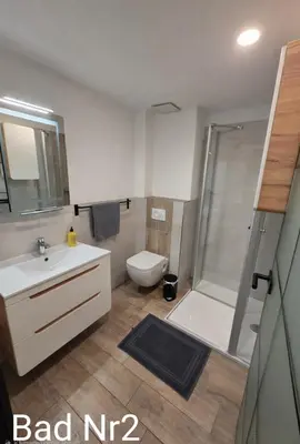 Ein Badezimmer in der Unterkunft Ferienwohnung NR4 DG Klima