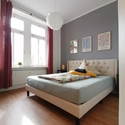 Ein Bett oder Betten in einem Zimmer der Unterkunft Die Wasserlilie in Dresden-Plauen