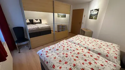 Ein Bett oder Betten in einem Zimmer der Unterkunft Ferienwohnung Berg und Kultur