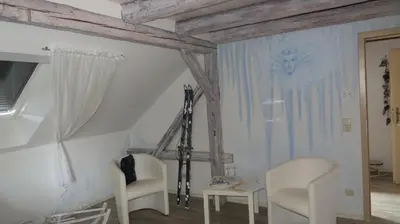 TV/Unterhaltungsangebot in der Unterkunft Märchenpension Rotkäppchen und der Wolf