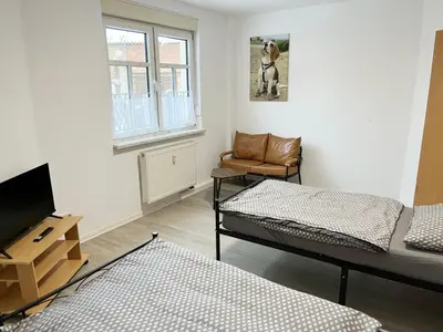 Ein Bett oder Betten in einem Zimmer der Unterkunft Monteurwohnung in Coswig