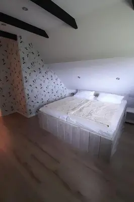 Ein Bett oder Betten in einem Zimmer der Unterkunft Holiday Home Mit der Natur im Einklang by Interhome