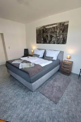 Ein Bett oder Betten in einem Zimmer der Unterkunft Apartment am Hofladen Hellendorf - Sächsische Schweiz by Interhome