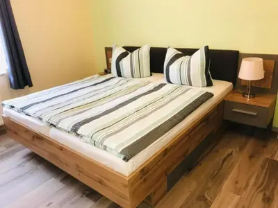 Ein Bett oder Betten in einem Zimmer der Unterkunft Apartment Horn by Interhome