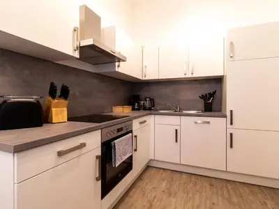 Küche/Küchenzeile in der Unterkunft Apartment Große Wohnung in Zentrum mit Kleinem Garten by Interhome