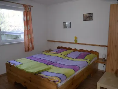 Ein Bett oder Betten in einem Zimmer der Unterkunft Holiday Home Panoramablick in Königstein by Interhome