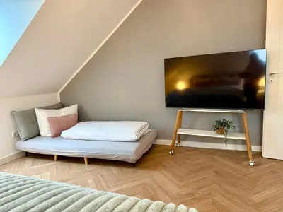 TV/Unterhaltungsangebot in der Unterkunft Neu!! Ruhige helle Penthouse Wohnung - Parking incl