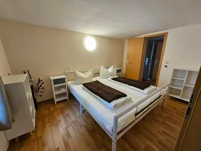 Ein Bett oder Betten in einem Zimmer der Unterkunft Ferienhaus am Urzeitpark Sebnitz