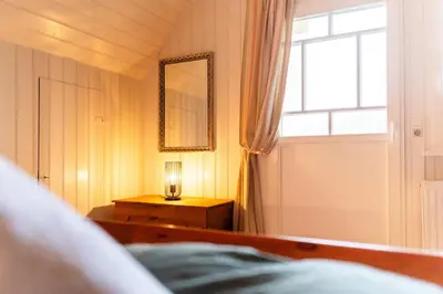 Ein Bett oder Betten in einem Zimmer der Unterkunft Villa Alice - Ferienhaus in der Naturidylle