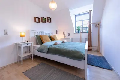 Ein Bett oder Betten in einem Zimmer der Unterkunft 2 room Sonnenberg Wi-Fi Netflix