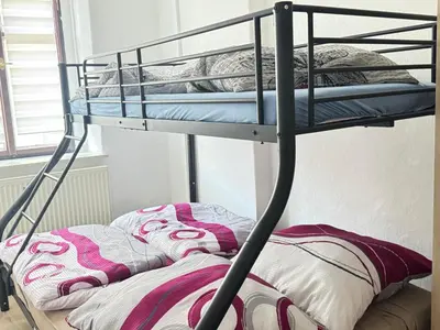 Ein Bett oder Betten in einem Zimmer der Unterkunft Aaron27