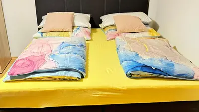 Ein Bett oder Betten in einem Zimmer der Unterkunft Aaron27