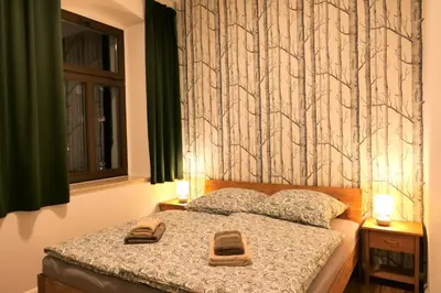 Ein Bett oder Betten in einem Zimmer der Unterkunft Apartment KARL KASSBERG mit sonnigem Balkon