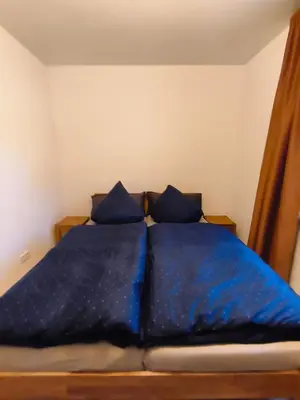 Ein Bett oder Betten in einem Zimmer der Unterkunft Michas FeWo