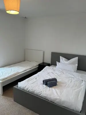 Ein Bett oder Betten in einem Zimmer der Unterkunft Tolle & geräumige Wohnung in Falkenberg