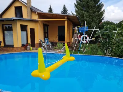 Der Swimmingpool an oder in der Nähe von gemütliches Ferienhaus mit privatem Außenpool