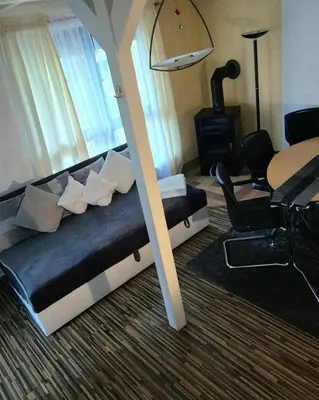 Ein Sitzbereich in der Unterkunft gemütliches Ferienhaus mit privatem Außenpool