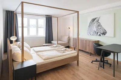 Ein Bett oder Betten in einem Zimmer der Unterkunft Aparthotel MY HOME Chemnitz-Limbach