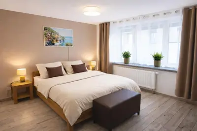 Ein Bett oder Betten in einem Zimmer der Unterkunft Ferienwohnung Saupe