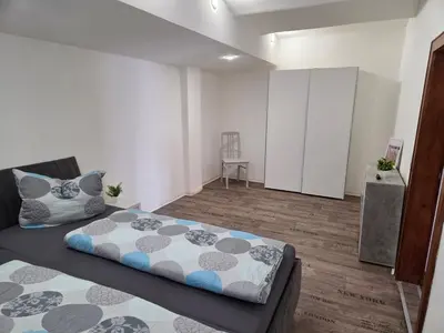 Ein Bett oder Betten in einem Zimmer der Unterkunft Ferienwohnung in Hilmersdorf