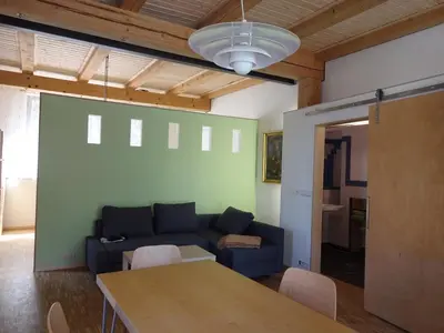 Ein Sitzbereich in der Unterkunft Alte Scheune Rietzschelhof mit Pool