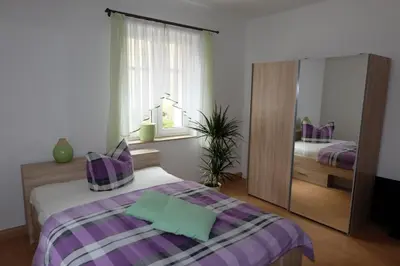 Ein Bett oder Betten in einem Zimmer der Unterkunft Im Kuckucksnest