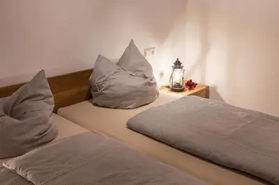 Ein Bett oder Betten in einem Zimmer der Unterkunft Haus Waldfrieden