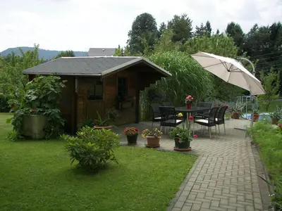 Ein Garten an der Unterkunft Gruppenausflug nach Sebnitz