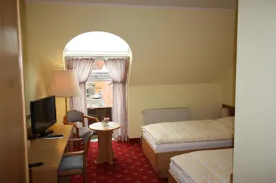 Ein Bett oder Betten in einem Zimmer der Unterkunft Hotel Bürgerhof