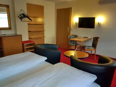 Ein Bett oder Betten in einem Zimmer der Unterkunft Pension Wehner