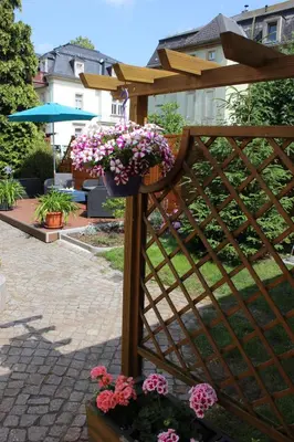 Ein Garten an der Unterkunft Weber Apartments