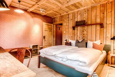 Ein Bett oder Betten in einem Zimmer der Unterkunft Bio-Hotel Zur Mühle