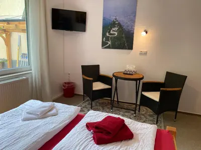Ein Bett oder Betten in einem Zimmer der Unterkunft W.I.P. Welt im Park
