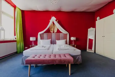 Ein Bett oder Betten in einem Zimmer der Unterkunft LaLeLu Hostel Dresden