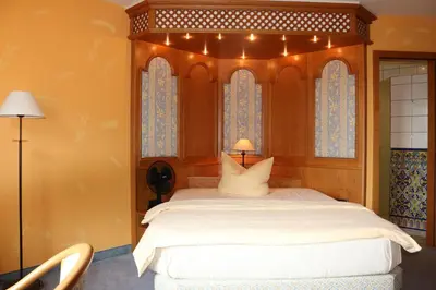 Ein Bett oder Betten in einem Zimmer der Unterkunft Hotel Spanischer Hof