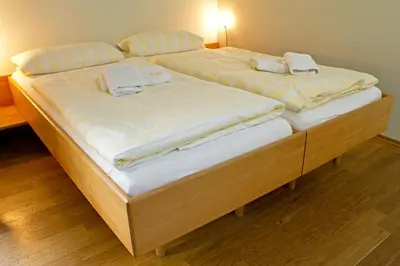 Ein Bett oder Betten in einem Zimmer der Unterkunft Alte Remise