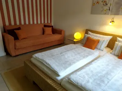 Ein Bett oder Betten in einem Zimmer der Unterkunft Ferienwohnung am Wäldchen