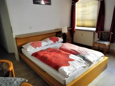 Ein Bett oder Betten in einem Zimmer der Unterkunft Pension Pieschen Dresden