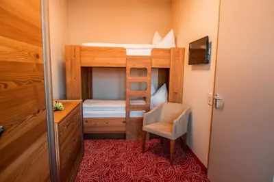 Ein Bett oder Betten in einem Zimmer der Unterkunft Hotel Freyhof