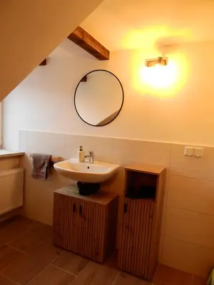 Ein Badezimmer in der Unterkunft Ferienwohnungen am Hauptplatz