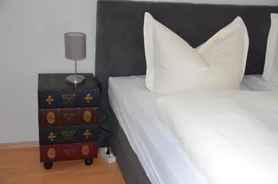 Ein Bett oder Betten in einem Zimmer der Unterkunft Ferienwohnungen in Dresden