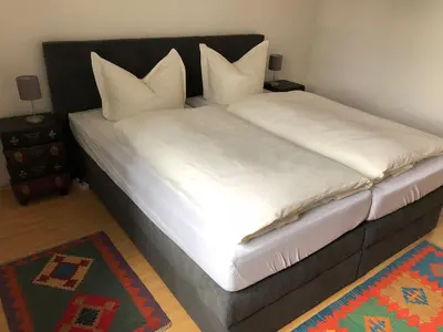 Ein Bett oder Betten in einem Zimmer der Unterkunft Ferienwohnungen in Dresden