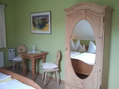 Ein Bett oder Betten in einem Zimmer der Unterkunft Elbschlösschen Refugium