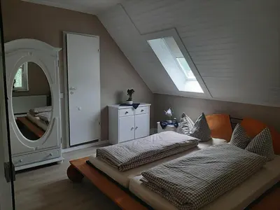 Ein Bett oder Betten in einem Zimmer der Unterkunft Elbschlösschen Refugium