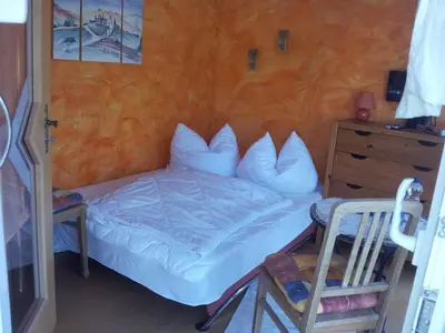Ein Bett oder Betten in einem Zimmer der Unterkunft Gartenhaus Nossen