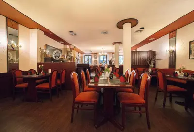 Ein Restaurant oder anderes Speiselokal in der Unterkunft Hotel Kreller