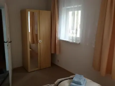 Ein Bett oder Betten in einem Zimmer der Unterkunft Ferienwohnung Mey