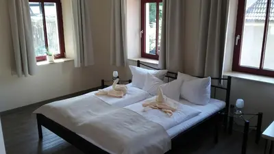 Ein Bett oder Betten in einem Zimmer der Unterkunft Weingut Jan Ulrich