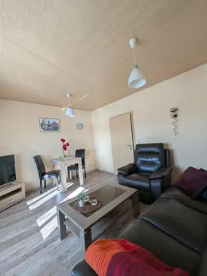 Ein Sitzbereich in der Unterkunft Ambiente an der Elbe, Wohnung OG