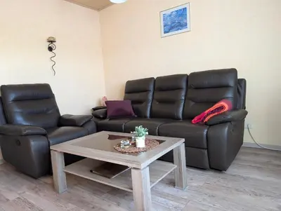 Ein Sitzbereich in der Unterkunft Ambiente an der Elbe, Wohnung OG